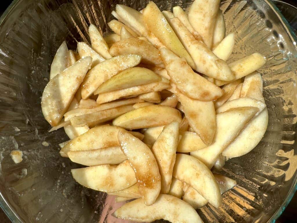 pears and filling ingredients mixed together in a glass bowl